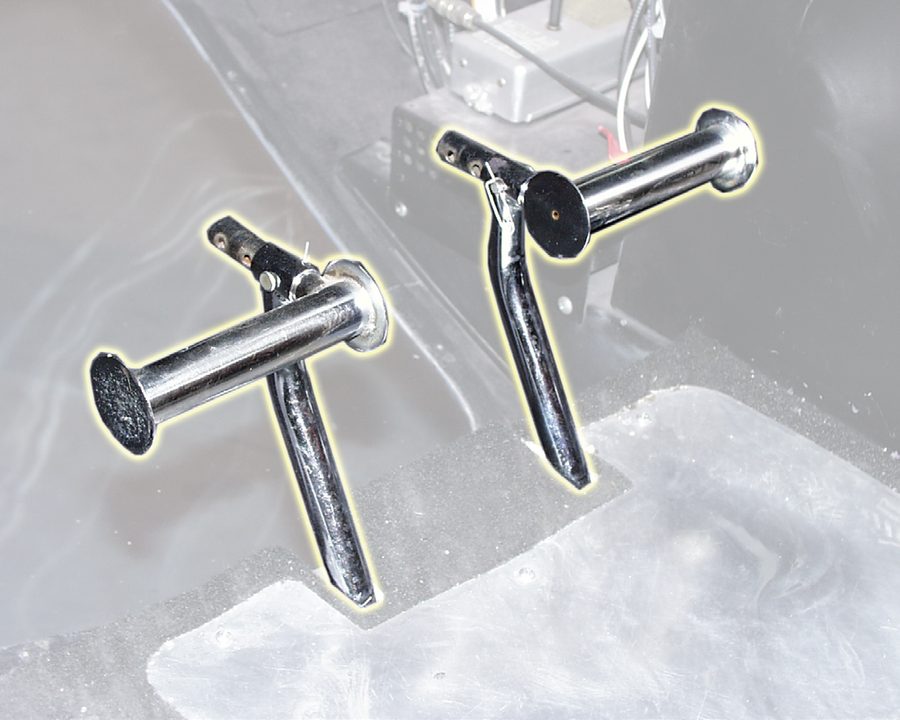 Photograph of a pair of helicopter anti-torque pedals on the cockpit floor.